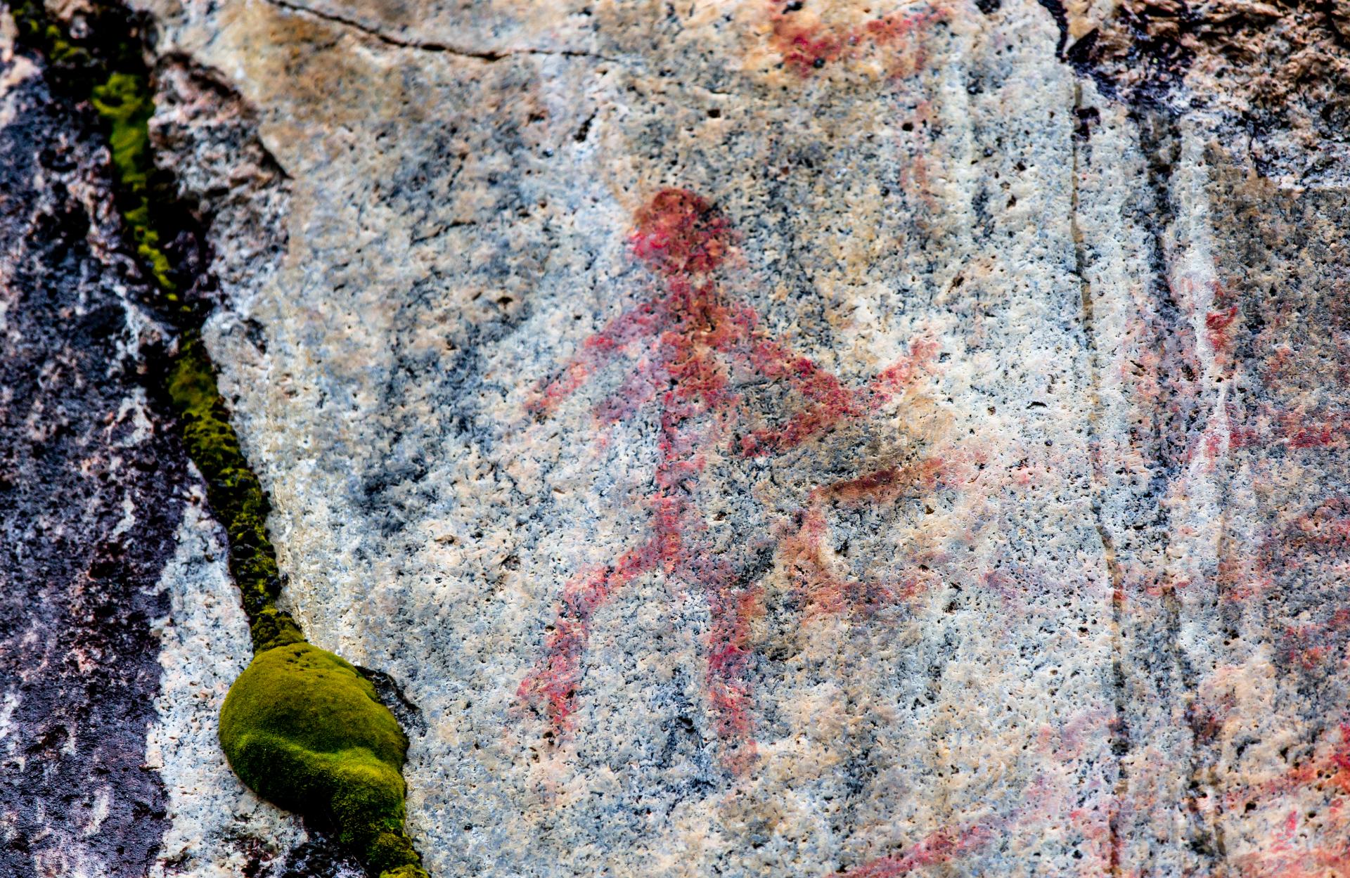 A rock painting representing a female figure. 
