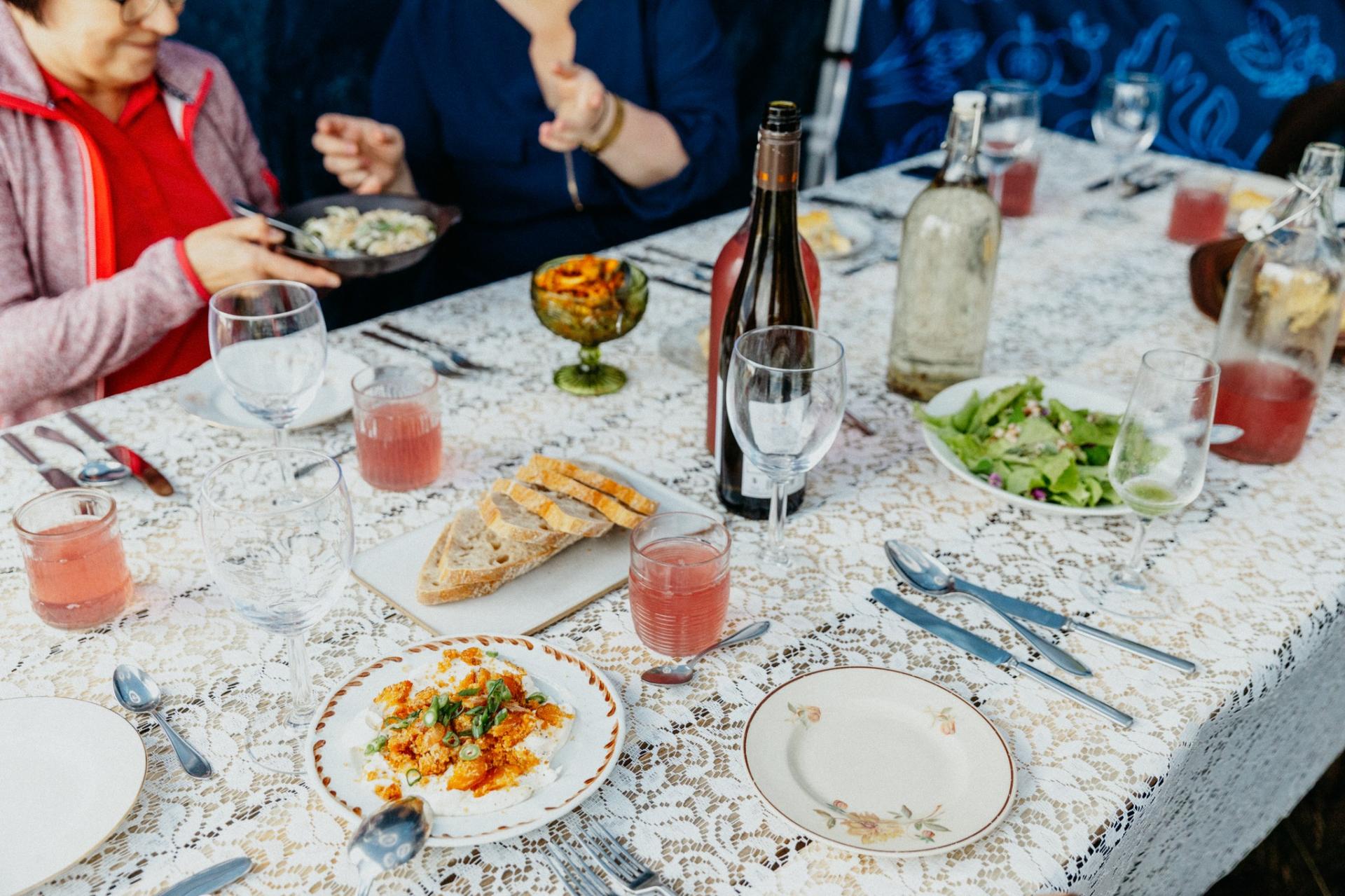 A set table with appetizers and dishes made of wild ingredients. 